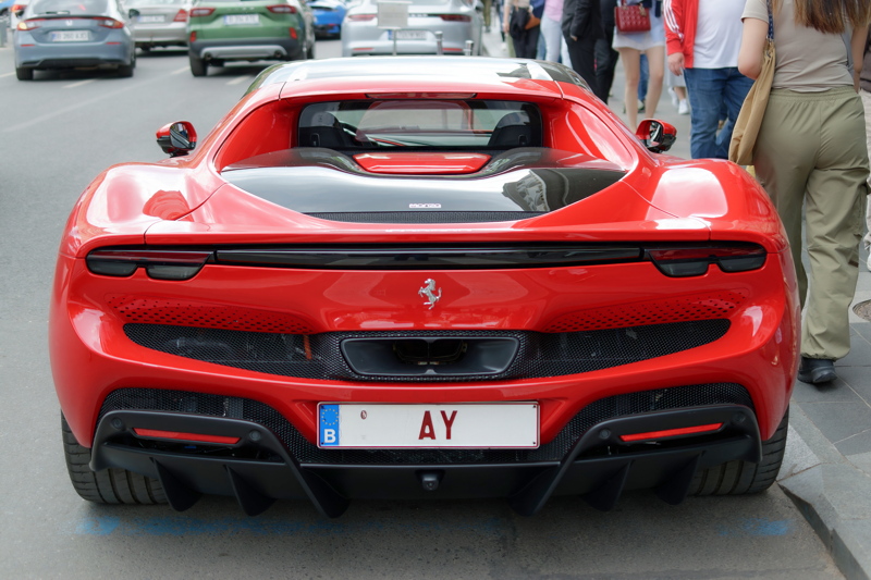 Red Ferrari 296 GTB or GTS plug-in hybrid supercar
